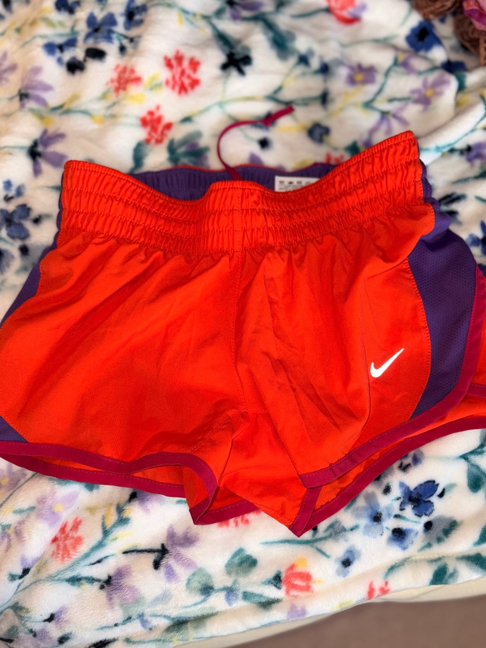 Nike Women’s Bright Orange Athletic Shorts with Purple Trim